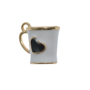 Close-up of a white enamel water cup charm with a gold trim and black heart pattern