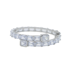 Close-up of silver hip hop bracelet featuring square cut clear zirconia stones
