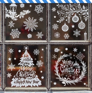 White Christmas window decals featuring snowflakes, trees and festive hanging ornaments
