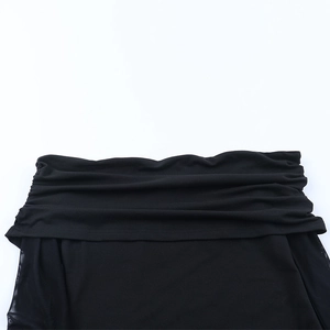 Detail of the pleated design and ruched texture on this black off-shoulder lace dress