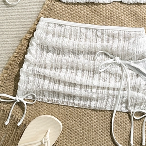Flachbild von weißem Strand-Sarong aus Spitze mit Jacquard-Muster und seitlichem Band