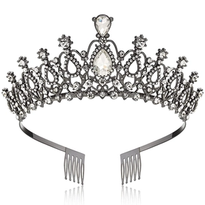 Detail of vintage silver bridal crown with crystal rhinestones and secure hair combs