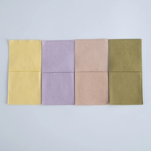 Detail view of microfiber jewelry envelope pouches in yellow, purple, pink and olive green