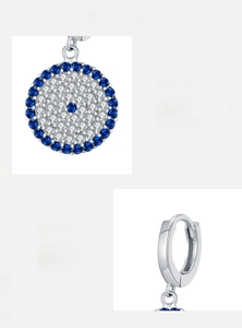 Detailed macro view of S925 sterling silver hoop earrings with blue and white zircons