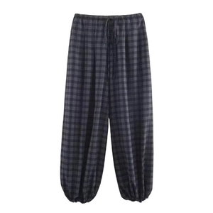 Women's plaid jogger pants with elastic drawstring waist and black and white checkered pattern
