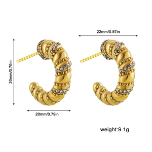 Detail shot of C-shaped gold-plated twist earrings with rhinestones and size dimensions