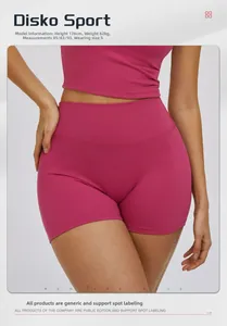 Close-up of high-waisted rose red yoga shorts showing seamless fabric texture and fit