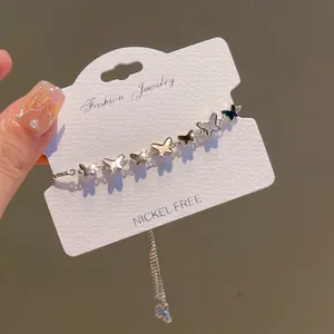 Silver butterfly bracelet with iridescent shells and adjustable drawstring chain