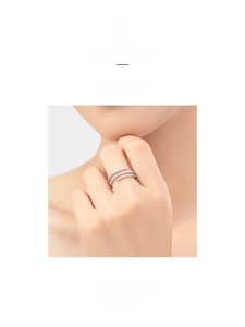 Macro detail of S925 sterling silver triple layered spiral ring with micro-pave zircons