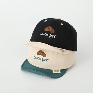 Detail of cute puppy embroidery on cotton baseball cap for toddlers in multiple colors