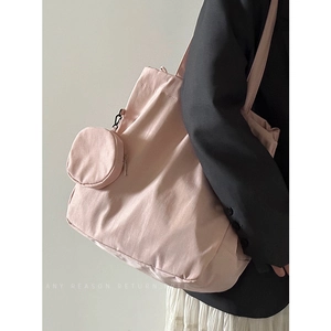 Pink nylon large capacity tote bag with small round coin purse for daily commute