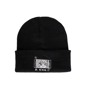 Bonnet en maille noire avec broderie d'yeux anime et texte japonais de style minimaliste