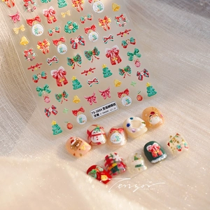 Detailed view of TS-3884 3D Christmas nail stickers with red bows and snowman patterns