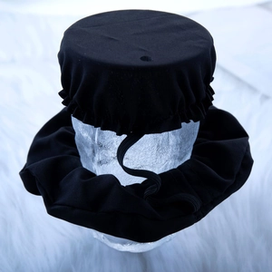 Elastic drink cover and scrunchie set in black fabric on glass jar for safety