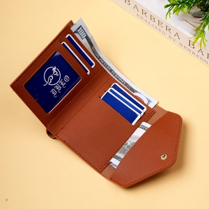 Close-up of brown litchi pattern tri-fold wallet with card slots and ID window