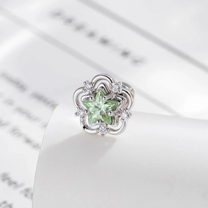 French vintage silver flower ear stud with star-shaped green zircon and sparkling stones