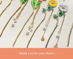 Detail of floral metal hairpins with pearl tassels in gold and silver finishes