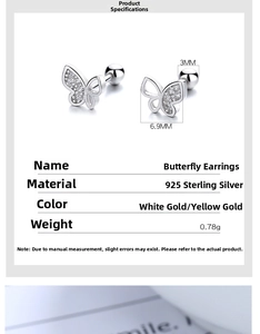 Detailed view of butterfly stud earrings in 925 sterling silver with cubic zirconia