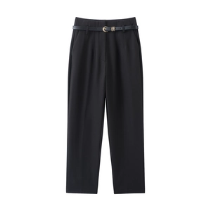 Close-up of high-waist straight leg trousers with slim belt and golden buckle