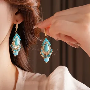 Boucles d'oreilles vintage en or avec turquoise, fleurs de diamants et perles