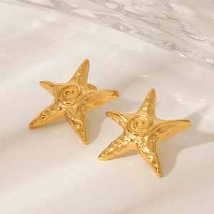 Textured 18k gold star earrings with hammered finish and spiral center star studs