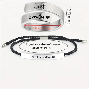 Adjustable black woven bracelet and silver steel ring set with Just Breathe engraving