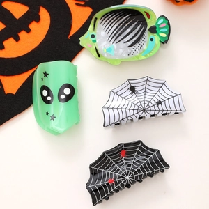 Halloween acetate hair claw set with alien, fish bone, and spider web designs for women