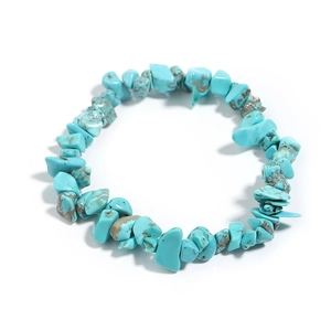 Close-up of turquoise agate stone bracelet with natural textures on white background