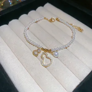 Bracelet de perles élégant avec pendentif gourde en zircon et finition dorée