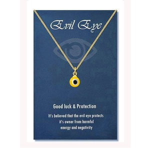 Detail of gold evil eye charm necklace presented on a blue symbolic card background