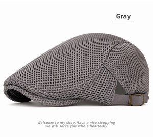 Close-up of gray mesh ivy cap featuring breathable fabric and adjustable bronze buckle