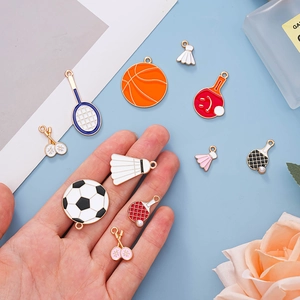 Assorted sports charms including soccer and badminton balls for DIY jewelry making
