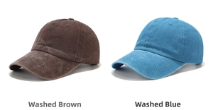 Detail view of washed vintage cotton baseball caps in coffee and blue colors