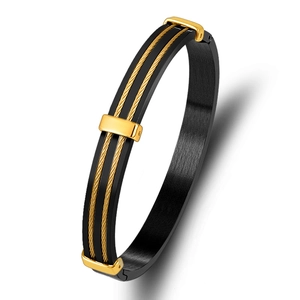 Black brushed stainless steel cable bracelet with gold accents and secure clasp