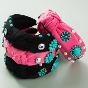Detailed view of Bohemian knotted headbands with turquoise beads and faux pearls