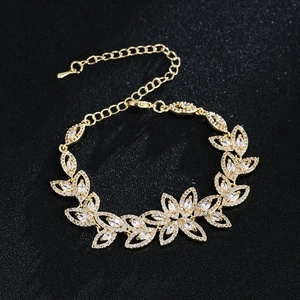 Exquisite gold flower bracelet with marquise cubic zirconia stones for bridal weddings