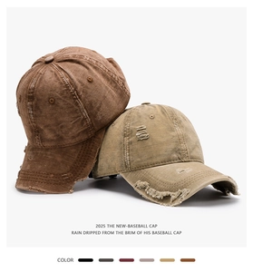 Detailed view of heavy washed vintage cotton baseball cap with distressed rip details