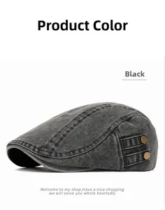 Detail view of washed black denim ivy cap with side metallic buckles and vintage texture