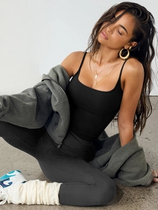 Close-up of black athletic tank top with high-quality texture and seamless stitching