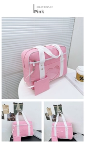 Detail of pink ita bag with heart window and small pouch for JK uniform style