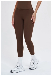 Close-up of high-waist yoga leggings in dark brown with seamless ergonomic tailoring