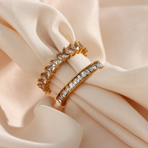 Fashionable 18K gold plated stainless steel rings with sparkling cubic zirconia inlay