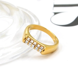 Flat edge 18K gold plated ring with double rows of square zircon on clear stand