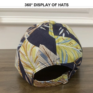 Detail view of tropical palm leaf print baseball cap with adjustable silver metal buckle