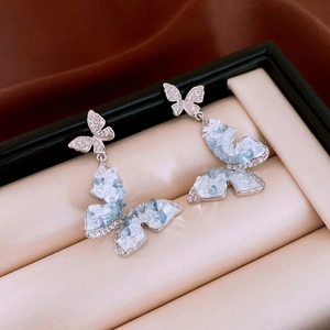 Exquisite silver butterfly earrings with light blue crystals and micro-paved rhinestones