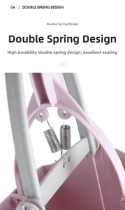 Detail of durable dual metal springs in pink pet pooper scooper for efficient pick up