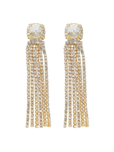 Detail of elegant gold-toned long tassel earrings with sparkling micro-set rhinestones