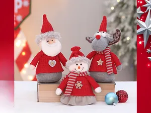 Detailed view of knitted Christmas gnome set with Santa Snowman and Reindeer figurines