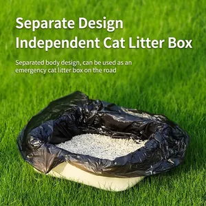 Portable cat litter box with separate design for travel shown on outdoor grass