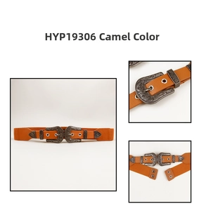 Close-up of vintage camel elastic belt with ornate engraved double metal buckle detail